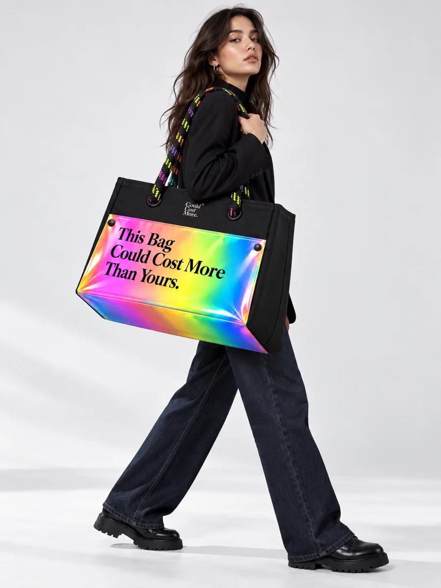 The Oversize Tote. carried by a model, for scale.